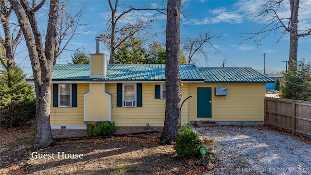 31401 S 620th Rd, Grove, OK 74344 - view of front of home featuring metal roof, a chimney, and cooling unit