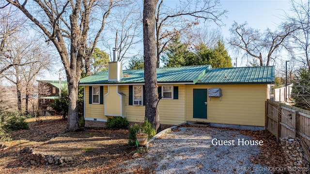 31401 S 620th Rd, Grove, OK 74344 - view of front of house featuring metal roof and a chimney