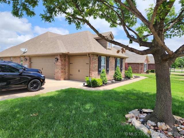14201 E 101st St, Owasso, OK 74055 - view of front facade with brick siding, an attached garage, a front lawn, driveway, and roof with shingles