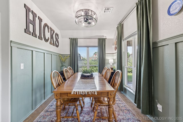 14201 E 101st St, Owasso, OK 74055 - dining area with a decorative wall