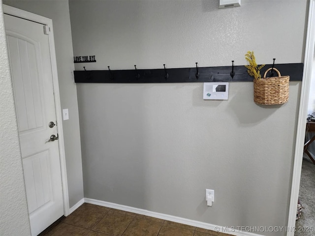 14201 E 101st St, Owasso, OK 74055 - mudroom featuring dark tile patterned floors and baseboards