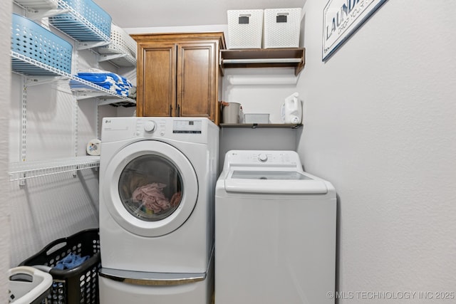 14201 E 101st St, Owasso, OK 74055 - washroom featuring washing machine and clothes dryer and cabinet space