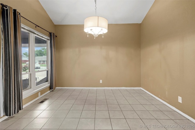 7630 E 54th Pl, Tulsa, OK 74145 - empty room with lofted ceiling and light tile patterned floors