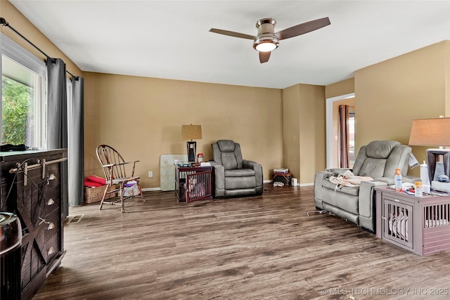 7630 E 54th Pl, Tulsa, OK 74145 - living room featuring wood finished floors and a ceiling fan