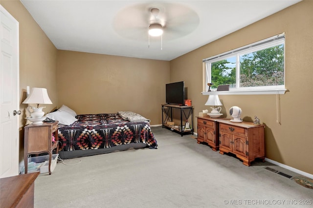 7630 E 54th Pl, Tulsa, OK 74145 - bedroom featuring light carpet and a ceiling fan