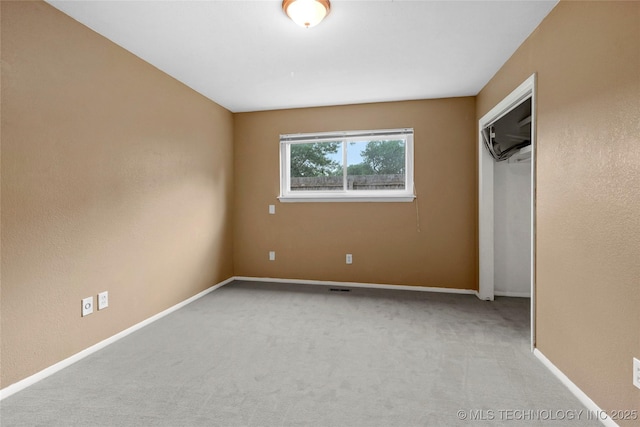 7630 E 54th Pl, Tulsa, OK 74145 - unfurnished bedroom with carpet flooring and baseboards