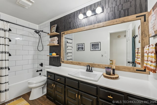 6717 E 99th St, Tulsa, OK 74133 - full bathroom with crown molding, vanity, toilet, shower / bathtub combination with curtain, and wood finished floors