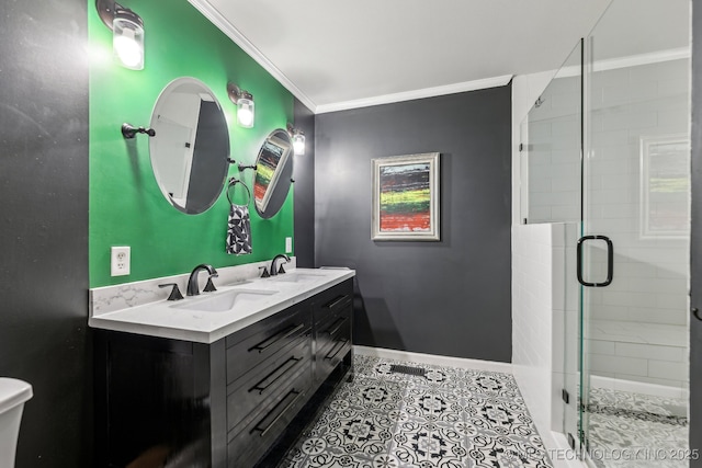 6717 E 99th St, Tulsa, OK 74133 - bathroom with crown molding, double vanity, a stall shower, toilet, and baseboards