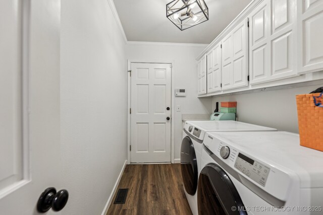 6717 E 99th St, Tulsa, OK 74133 - washroom featuring washer and dryer, cabinet space, ornamental molding, dark wood finished floors, and baseboards