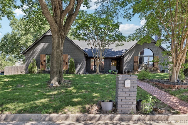 6717 E 99th St, Tulsa, OK 74133 - view of front facade featuring brick siding