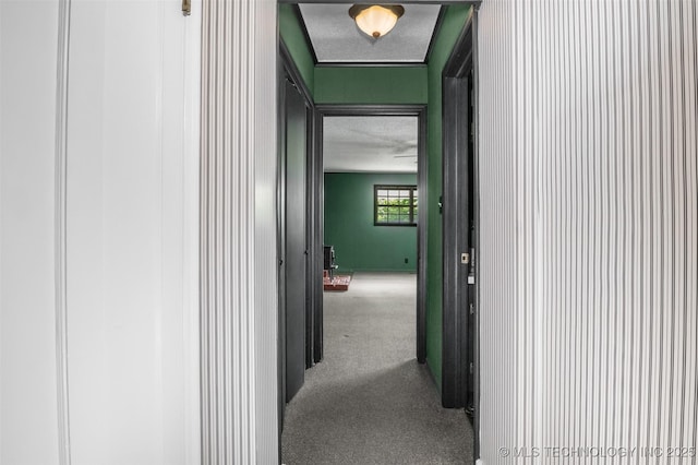 2728 E 13th Pl, Tulsa, OK 74104 - hallway featuring carpet flooring and a textured ceiling