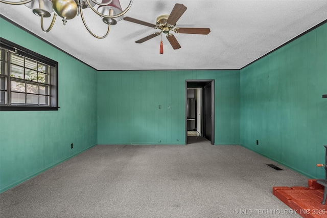 2728 E 13th Pl, Tulsa, OK 74104 - carpeted spare room with a ceiling fan and a textured ceiling