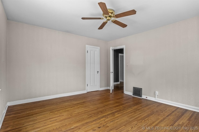 2728 E 13th Pl, Tulsa, OK 74104 - spare room with wood finished floors, baseboards, and a ceiling fan