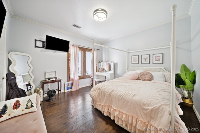 9914 S Garnett Rd, Broken Arrow, OK 74012 - bedroom with crown molding, baseboards, and dark wood-type flooring