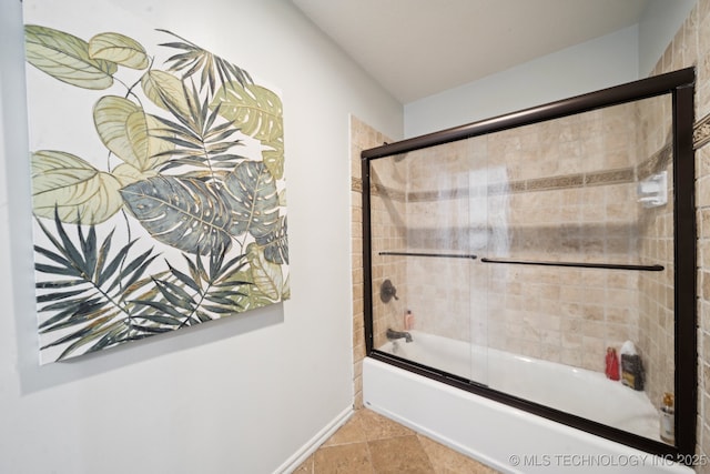 9914 S Garnett Rd, Broken Arrow, OK 74012 - full bathroom with shower / bath combination with glass door and baseboards
