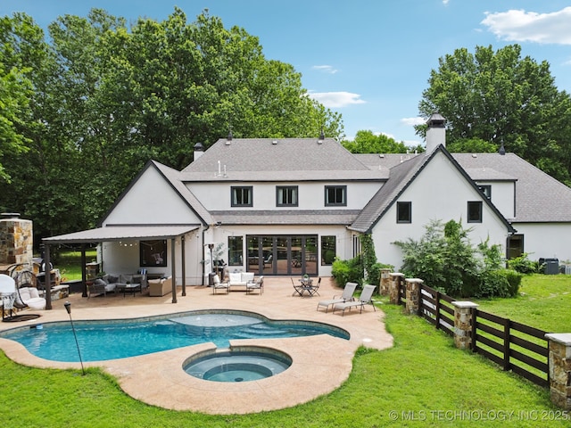 9914 S Garnett Rd, Broken Arrow, OK 74012 - back of house featuring an outdoor living space, a chimney, stucco siding, a patio area, and central air condition unit