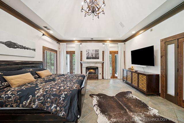 9914 S Garnett Rd, Broken Arrow, OK 74012 - bedroom featuring access to outside, a warm lit fireplace, a chandelier, recessed lighting, and a high ceiling