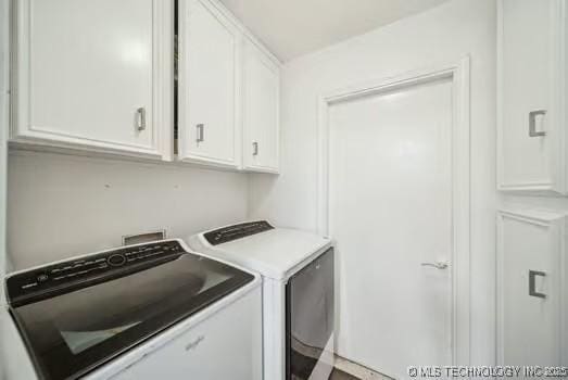 7450 N 117th E Ave, Owasso, OK 74055 - laundry area featuring cabinet space and independent washer and dryer