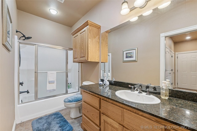 2508 S 14th St, Mcalester, OK 74501 - full bathroom featuring toilet, vanity, combined bath / shower with glass door, and tile patterned floors