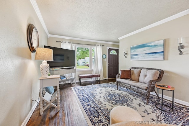 3508 E 30th St, Tulsa, OK 74114 - living room with wood finished floors, a textured ceiling, crown molding, and baseboards