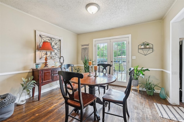 3508 E 30th St, Tulsa, OK 74114 - dining room featuring crown molding, a textured ceiling, dark wood-type flooring, baseboards, and french doors