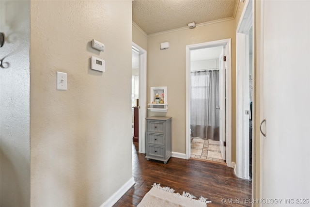 3508 E 30th St, Tulsa, OK 74114 - hall with dark wood-type flooring, crown molding, and baseboards