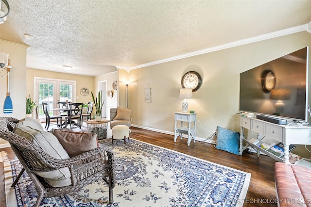 3508 E 30th St, Tulsa, OK 74114 - living room with wood finished floors, a textured ceiling, ornamental molding, and baseboards