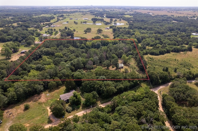 5164 Smiser Rd, Calera, OK 74730 - aerial view of property's location with a heavily wooded area and property boundaries highlighted