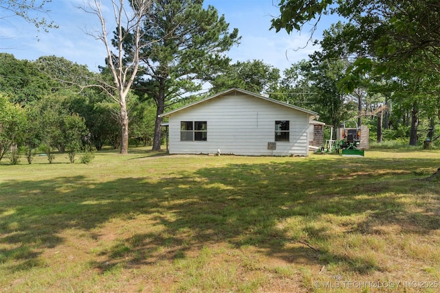 5164 Smiser Rd, Calera, OK 74730 - view of home's exterior with a lawn