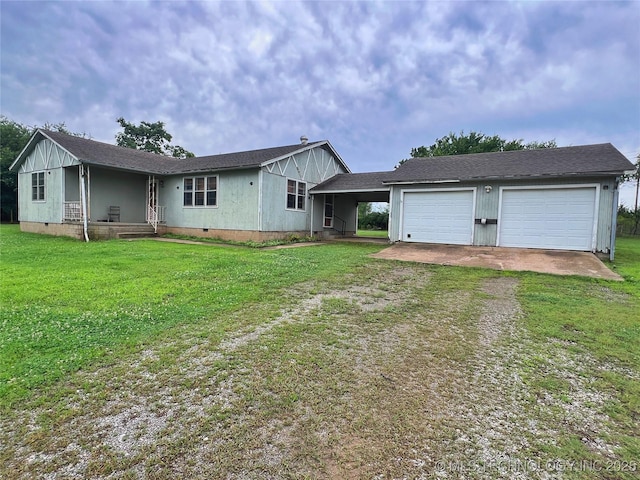 5006 S 449th Ave W, Jennings, OK 74038 - back of property with driveway, crawl space, a lawn, and an attached garage