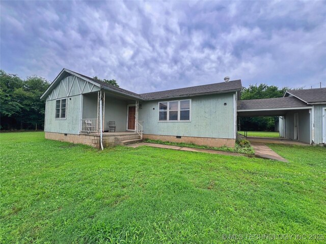 5006 S 449th Ave W, Jennings, OK 74038 - view of front of property featuring crawl space, a front yard, a carport, and a porch