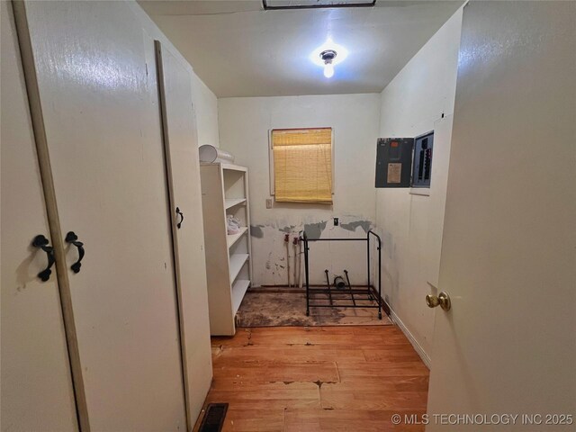 5006 S 449th Ave W, Jennings, OK 74038 - corridor with light wood-style flooring and electric panel