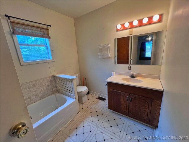 5006 S 449th Ave W, Jennings, OK 74038 - full bath with a bath, vanity, toilet, tile patterned floors, and baseboards