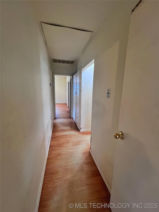 5006 S 449th Ave W, Jennings, OK 74038 - hall with baseboards and light wood-type flooring
