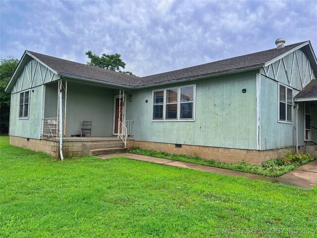 5006 S 449th Ave W, Jennings, OK 74038 - view of front of home featuring crawl space, a front lawn, covered porch, and a shingled roof