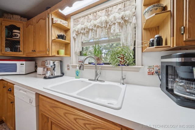 2018 Baker Dr, Mannford, OK 74044 - kitchen featuring white appliances, a sink, open shelves, and brown cabinetry