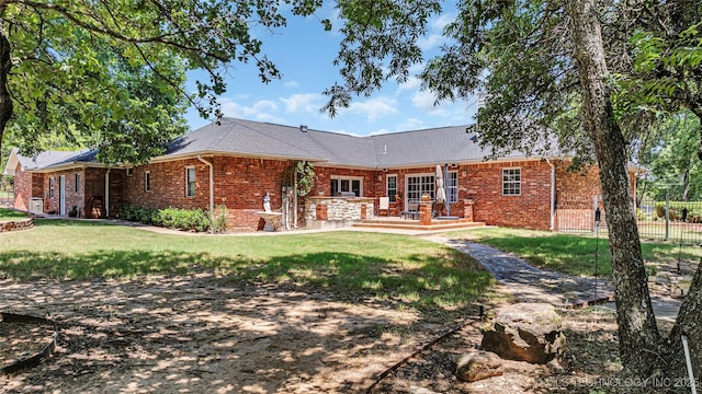 7023 Myall Rd, Lone Grove, OK 73443 - rear view of property with brick siding and a deck