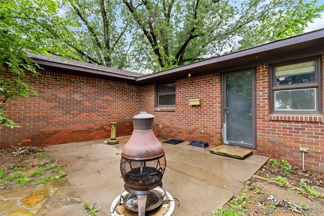 2506 Haskell Blvd, Muskogee, OK 74403 - view of patio / terrace featuring a fire pit
