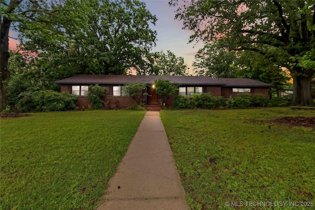 2506 Haskell Blvd, Muskogee, OK 74403 - single story home featuring a yard and brick siding