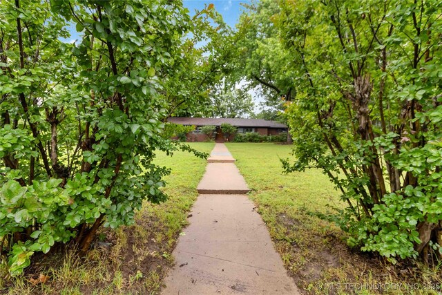 2506 Haskell Blvd, Muskogee, OK 74403 - view of property's community featuring a yard