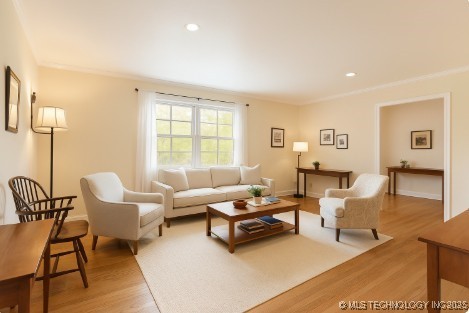 2506 Haskell Blvd, Muskogee, OK 74403 - living area with light wood-style flooring, crown molding, and recessed lighting