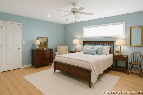 2506 Haskell Blvd, Muskogee, OK 74403 - bedroom with light wood-style flooring, ceiling fan, recessed lighting, and baseboards