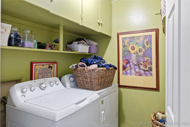 2506 Haskell Blvd, Muskogee, OK 74403 - washroom with washing machine and dryer and cabinet space