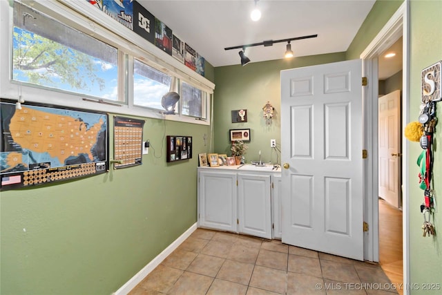 2506 Haskell Blvd, Muskogee, OK 74403 - bar area featuring light tile patterned floors, plenty of natural light, baseboards, and track lighting
