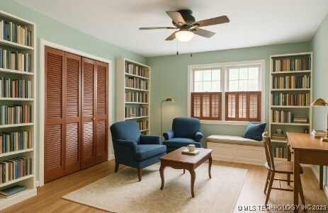2506 Haskell Blvd, Muskogee, OK 74403 - sitting room featuring wood finished floors and ceiling fan