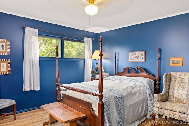 2506 Haskell Blvd, Muskogee, OK 74403 - bedroom featuring wood finished floors, ceiling fan, and ornamental molding