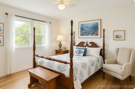 2506 Haskell Blvd, Muskogee, OK 74403 - bedroom featuring wood finished floors and baseboards