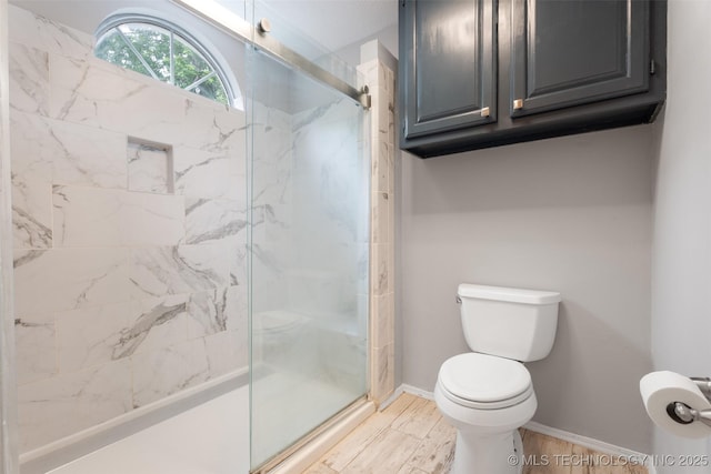 1802 S Fir Pl, Broken Arrow, OK 74012 - bathroom with a marble finish shower, toilet, and baseboards