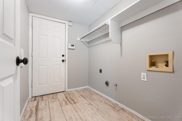 1802 S Fir Pl, Broken Arrow, OK 74012 - washroom featuring hookup for an electric dryer, hookup for a gas dryer, washer hookup, light wood-style floors, and baseboards