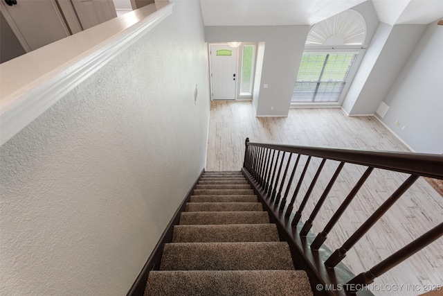 1802 S Fir Pl, Broken Arrow, OK 74012 - stairway with wood finished floors, baseboards, and a textured wall